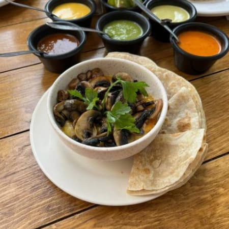 Queso Fundido con Champiñones
