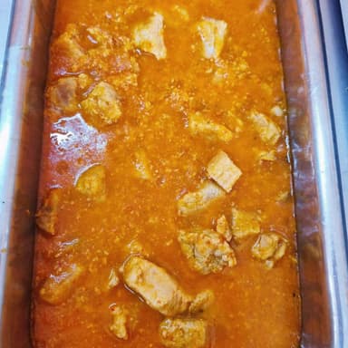 Taco De Pierna De Puerco en Salsa Roja