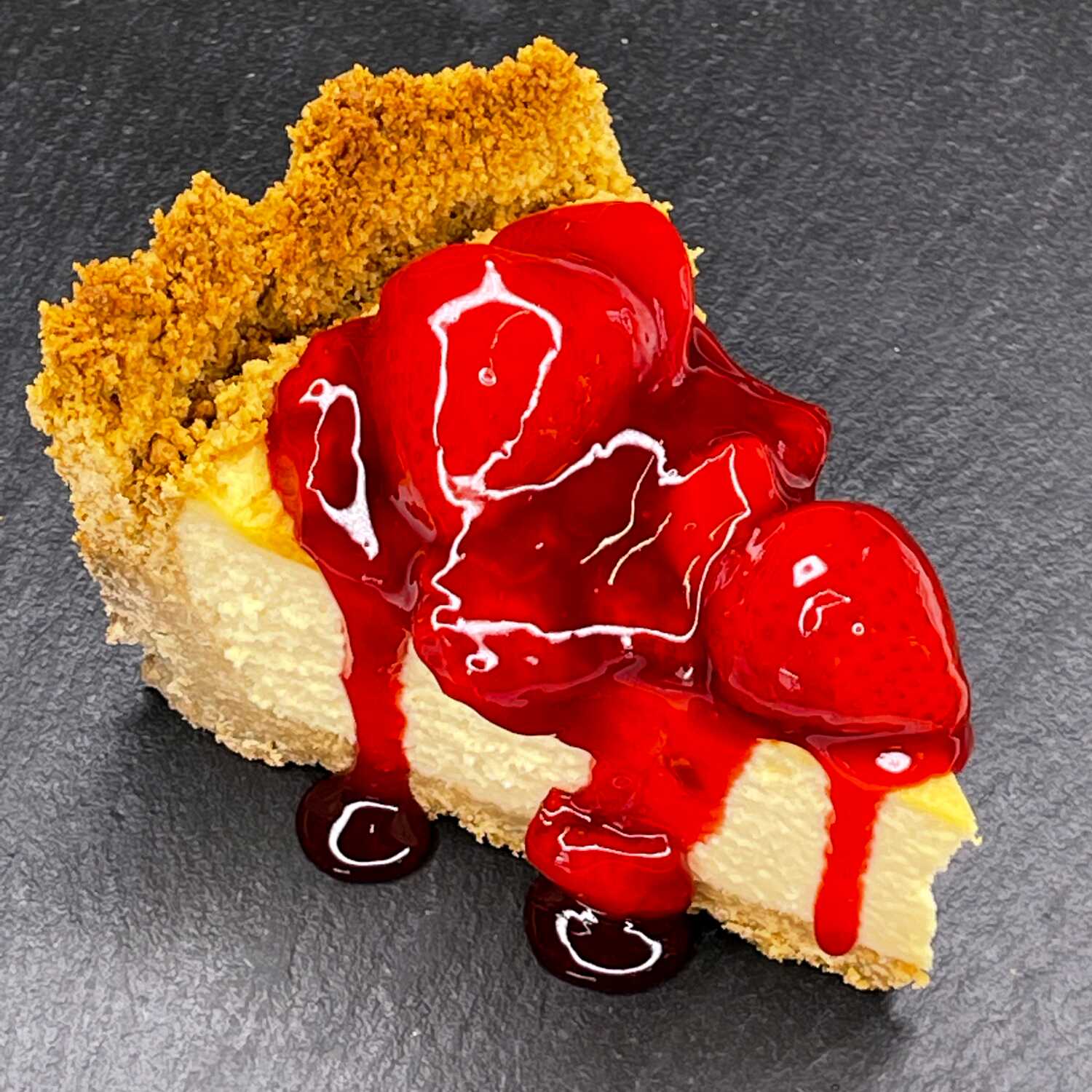 Rebanada de Cheesecake tipo NY con Fresa