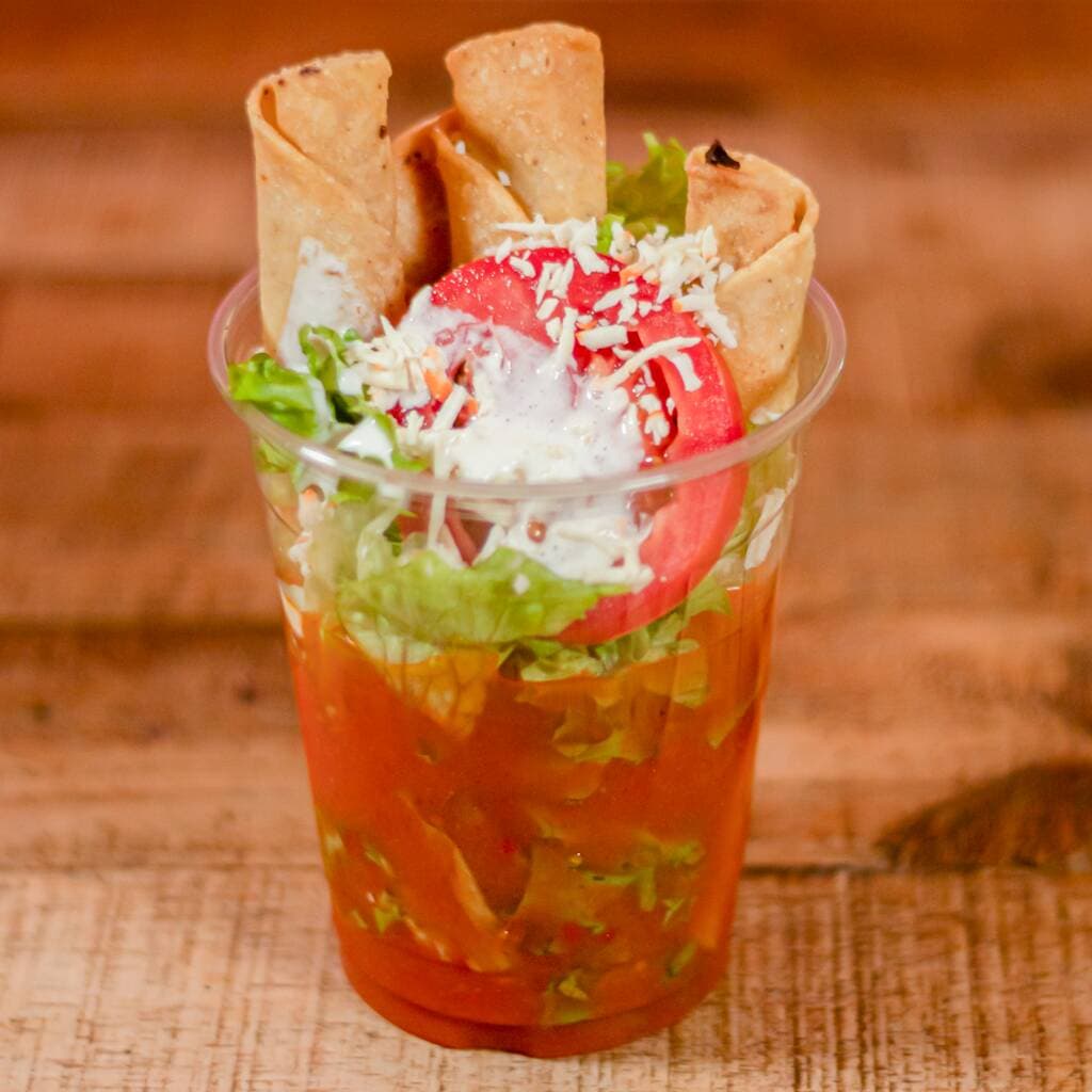 Tacos Ahogados en Salsa Roja de Chorizo