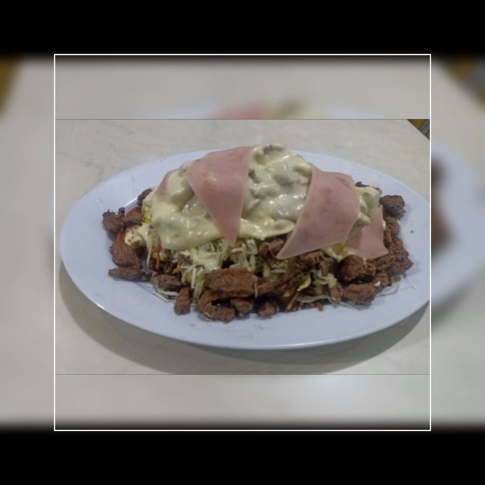 Salchipapa de Carne