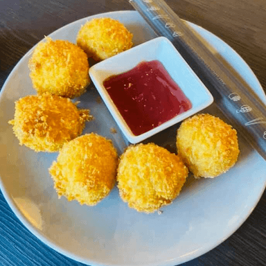 Orden Bolitas de papa rellenas de queso manchego