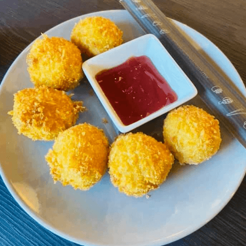 Orden Bolitas de papa rellenas de queso manchego