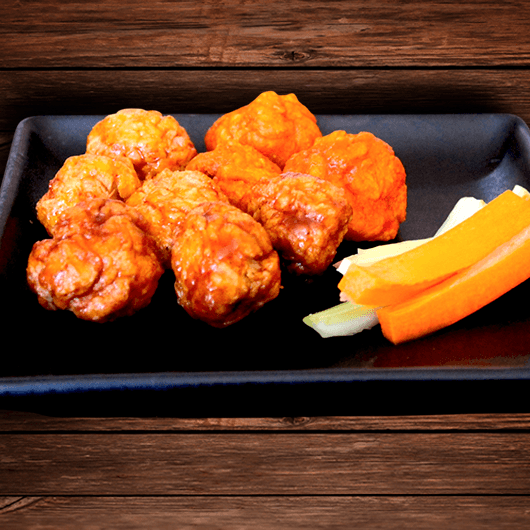 9 Boneless con Papas Fritas Cajun