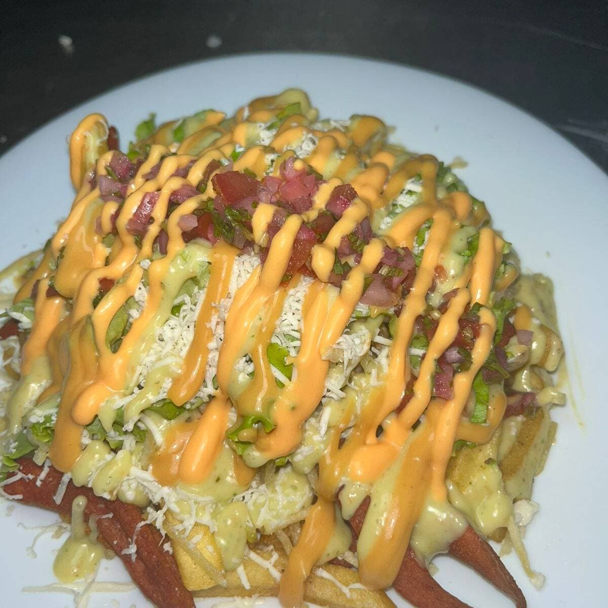 Salchipapa Pollo Suiza