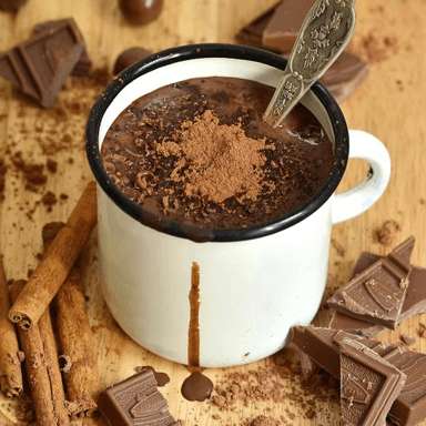 Chocolate con Leche de 16oz y Gratis Pan de Dulce