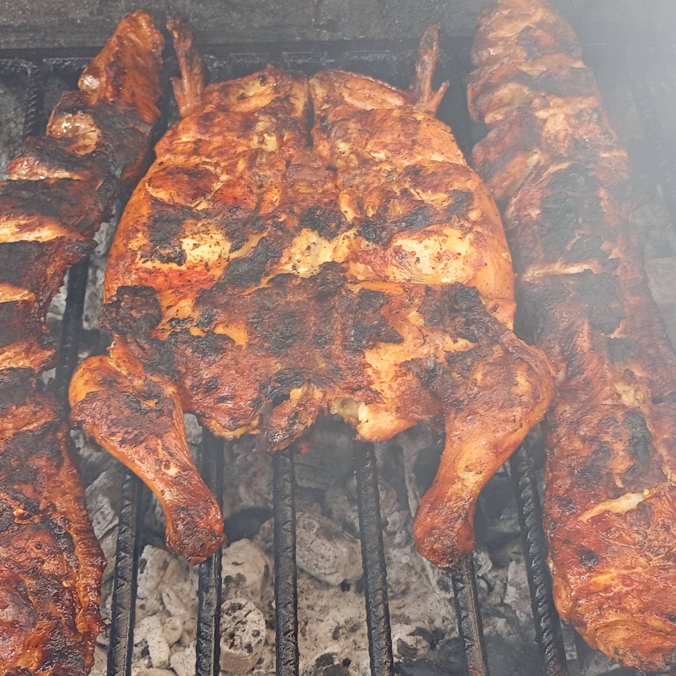 1/2 Pollo Asado + 1/2 Kilo de Costilla