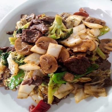 Carne con Champiñones