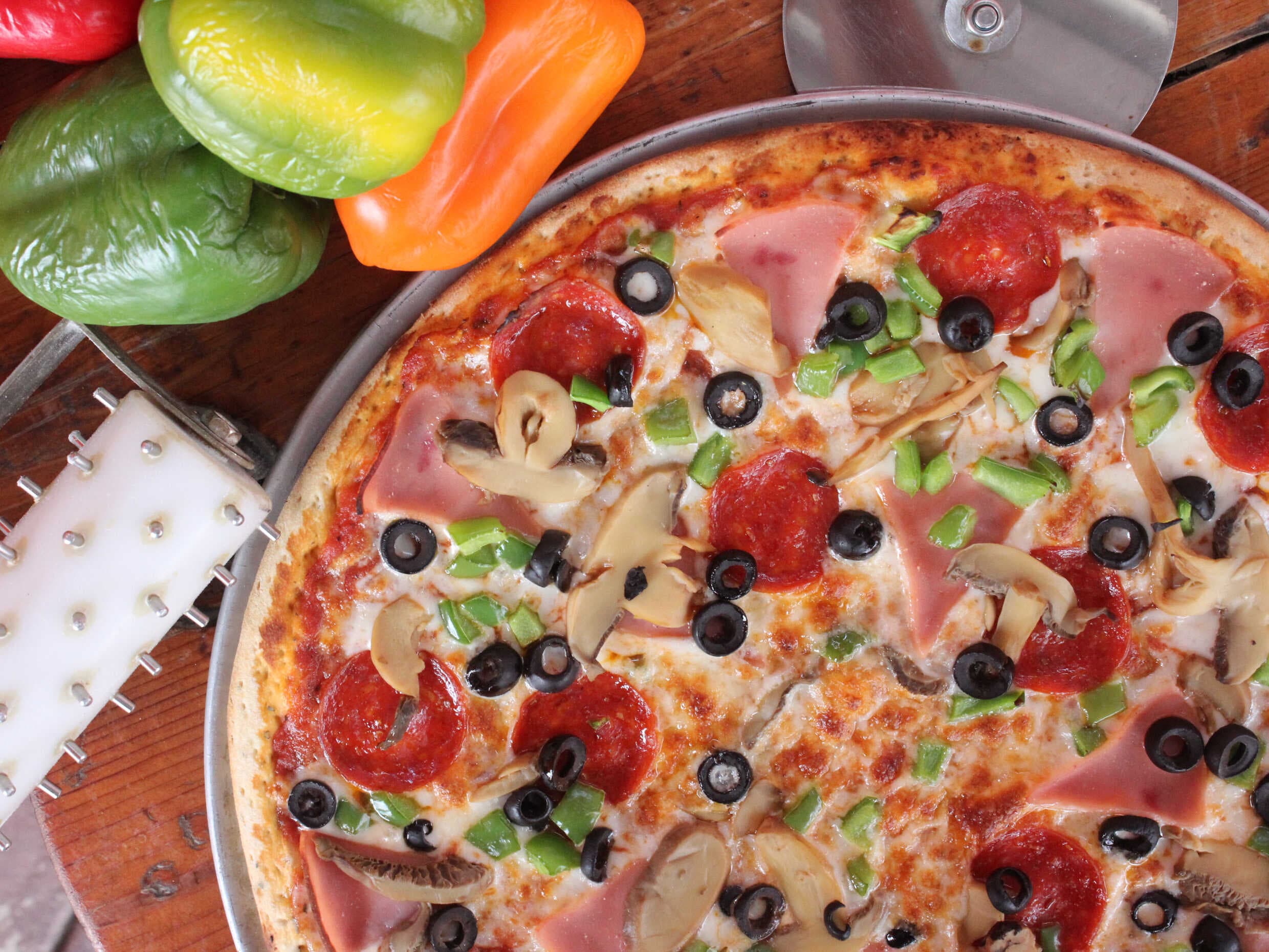 Pizza Star "hechas en horno de leña"