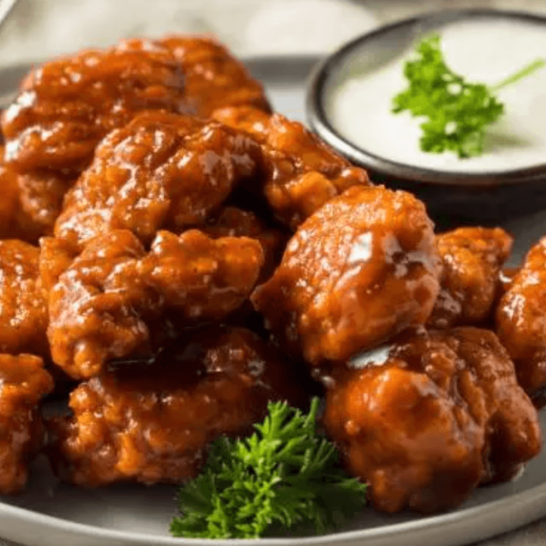 30 Boneles de Chipotle Acompañadas de Papas, Refre