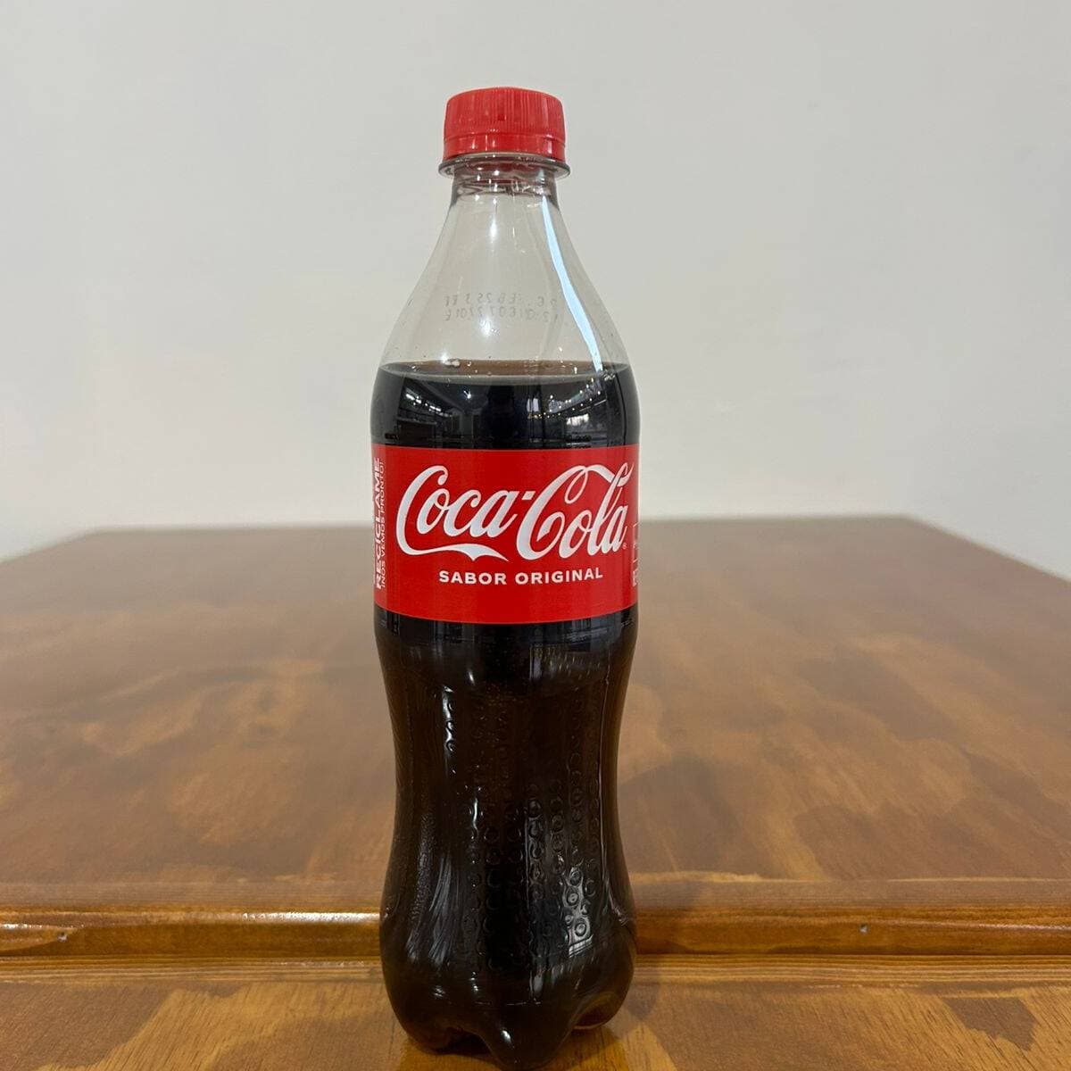 Refresco de cola de 600 ml.
