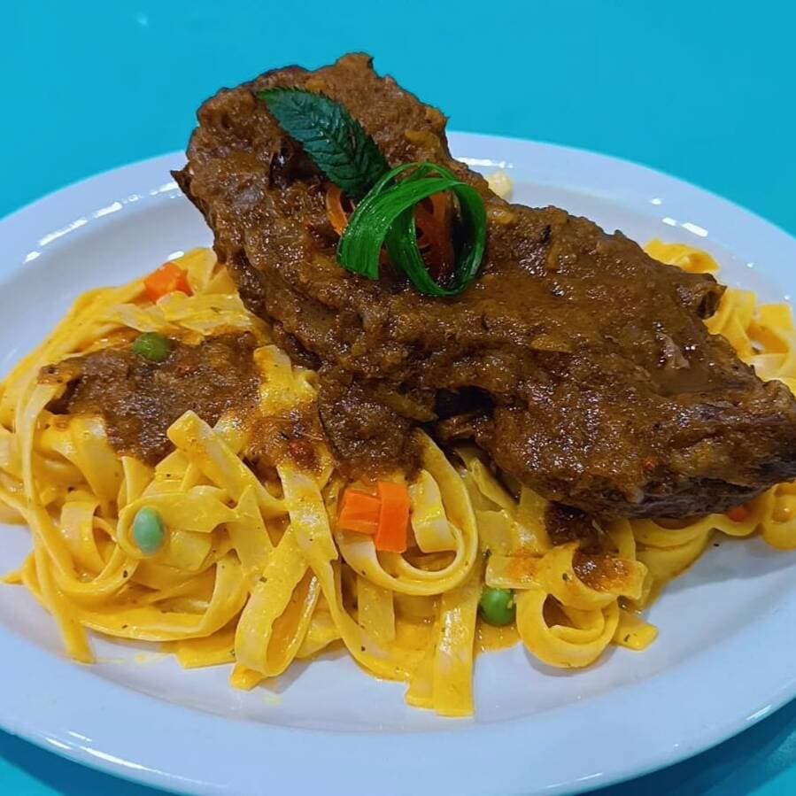 Fetuccini a la Huancaína con Cordero