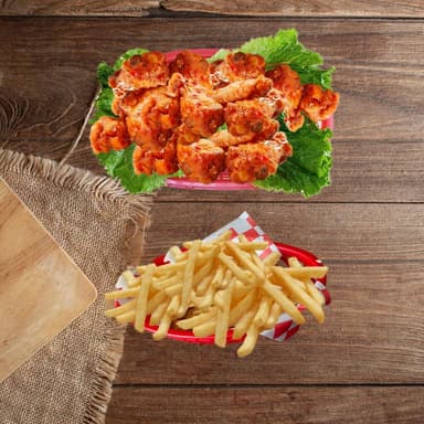 22 piezas de alitas + 220 gr de papas ala francesa