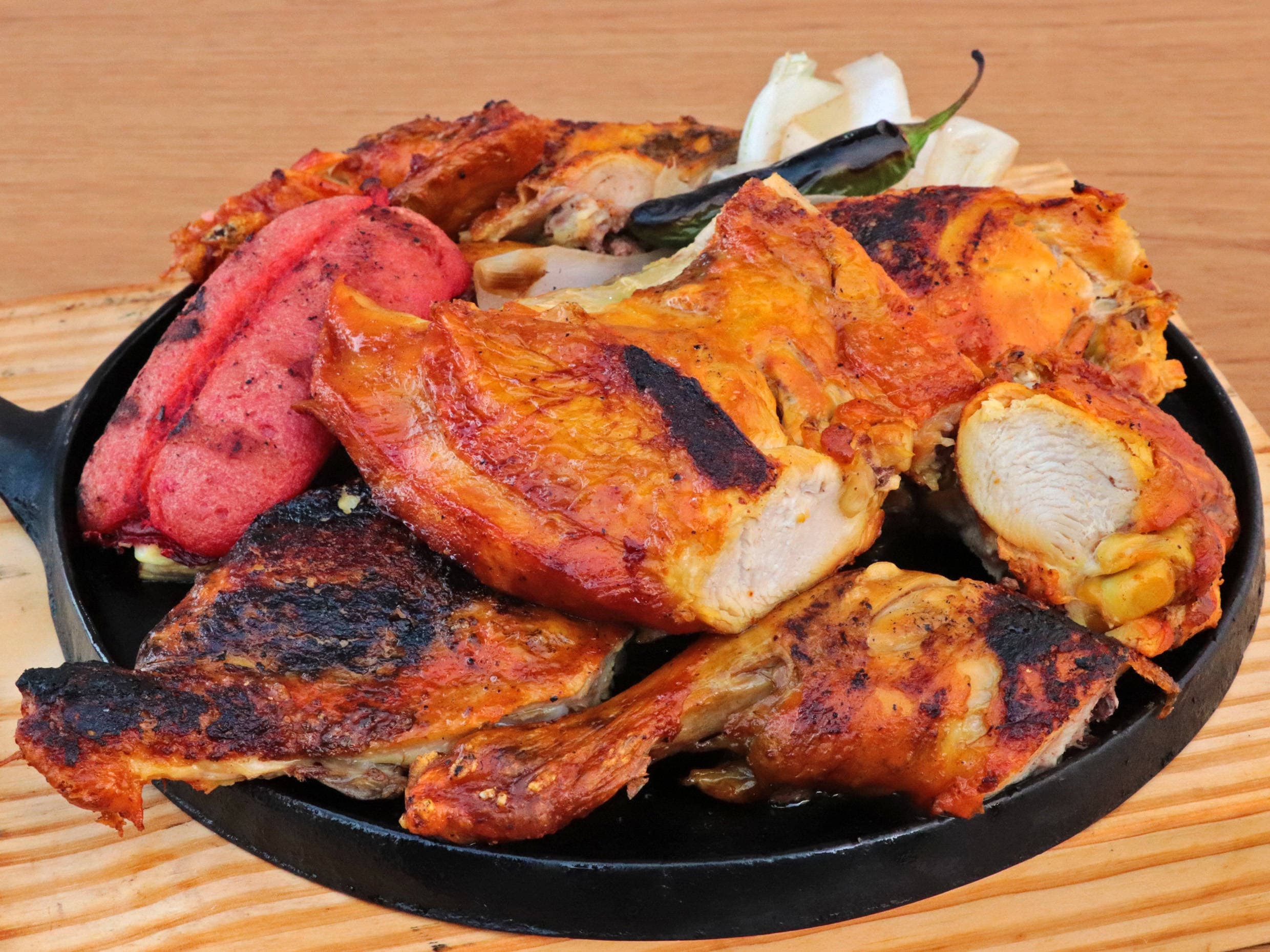Paquete Medio de Carne Asada y Medio Pollo Asado.