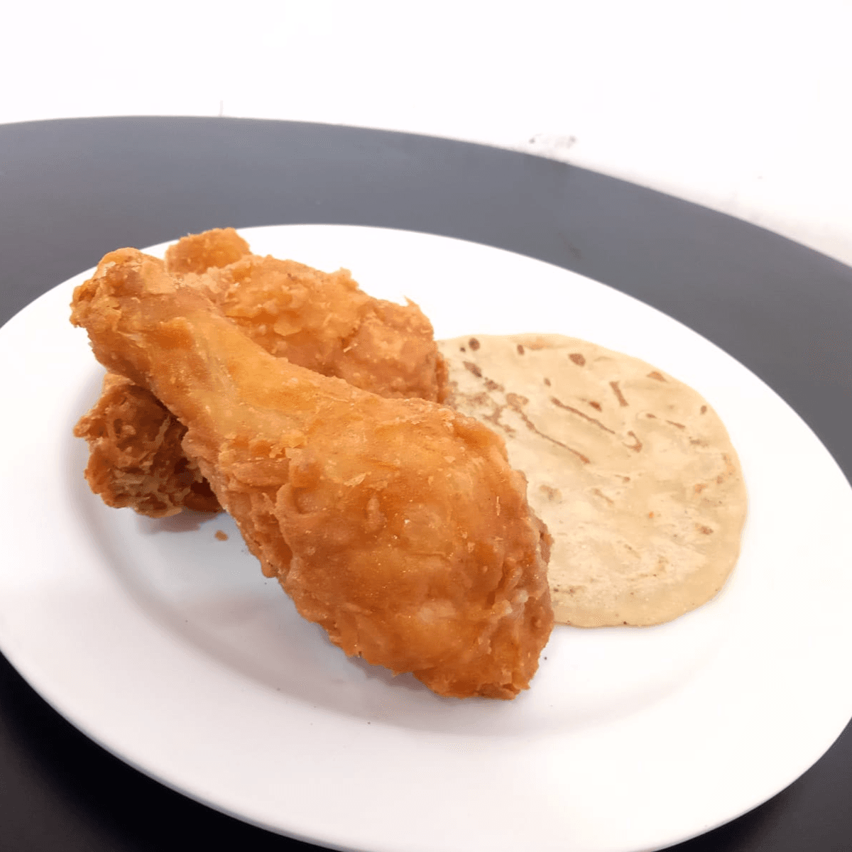 Porción de Pollo Frito
