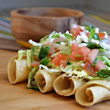 Flautas de Pollo más coca cola