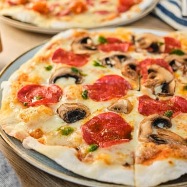 Pizza Personal Pepperoni Pesto y Champiñón