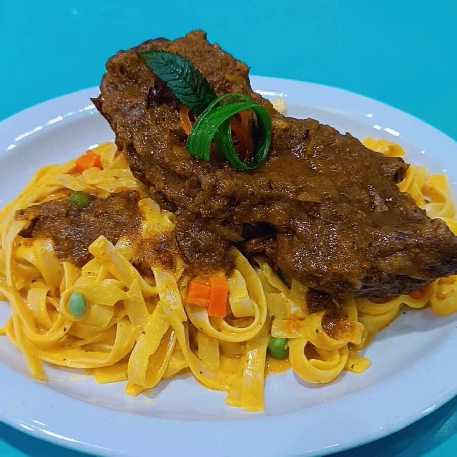 Fetuccini a la Huancaína con Cordero