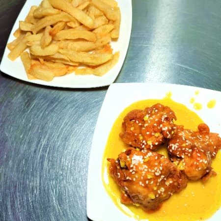 Porcio Pollo a la Naranja