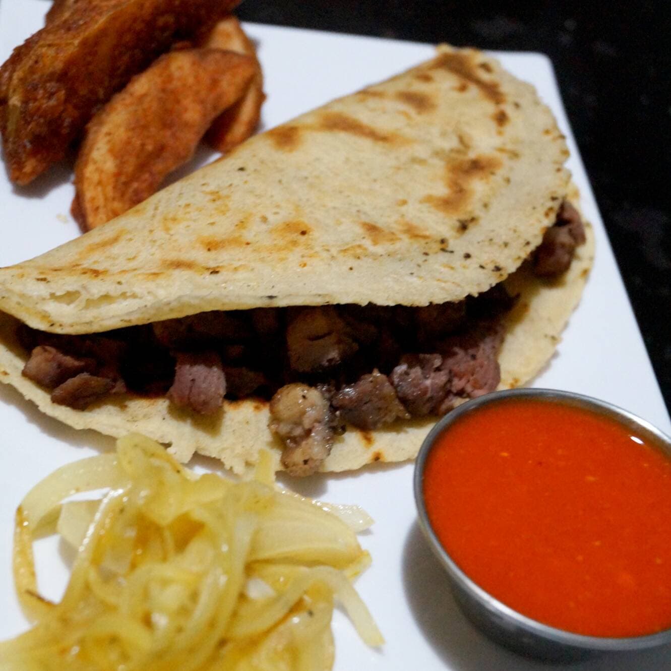 TACOSTRUDO GRANDE BISTEC.