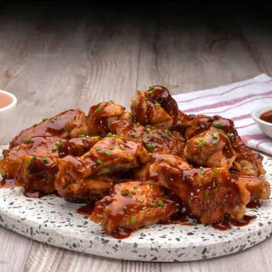 Combo Alitas Crocantes en Salsa X 8 + Papa