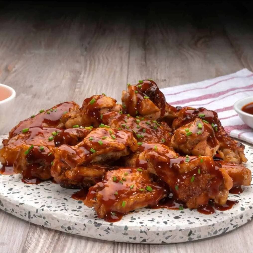 Combo Alitas Crocantes en Salsa X 8 + Papa