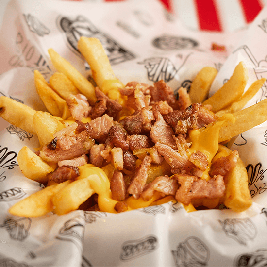 Papas con Queso Cheddar & Tocineta