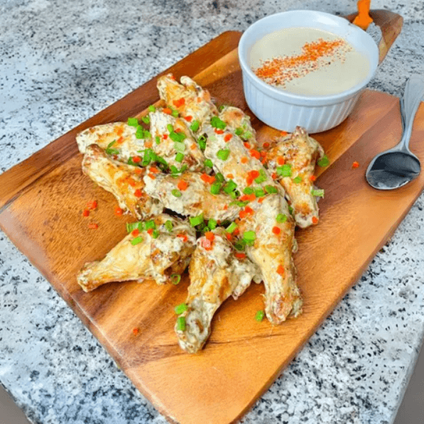 Alitas Acevichadas + Papas Fritas