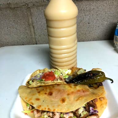 Combo #1  Taco, Quesadila y Cebada de Litro
