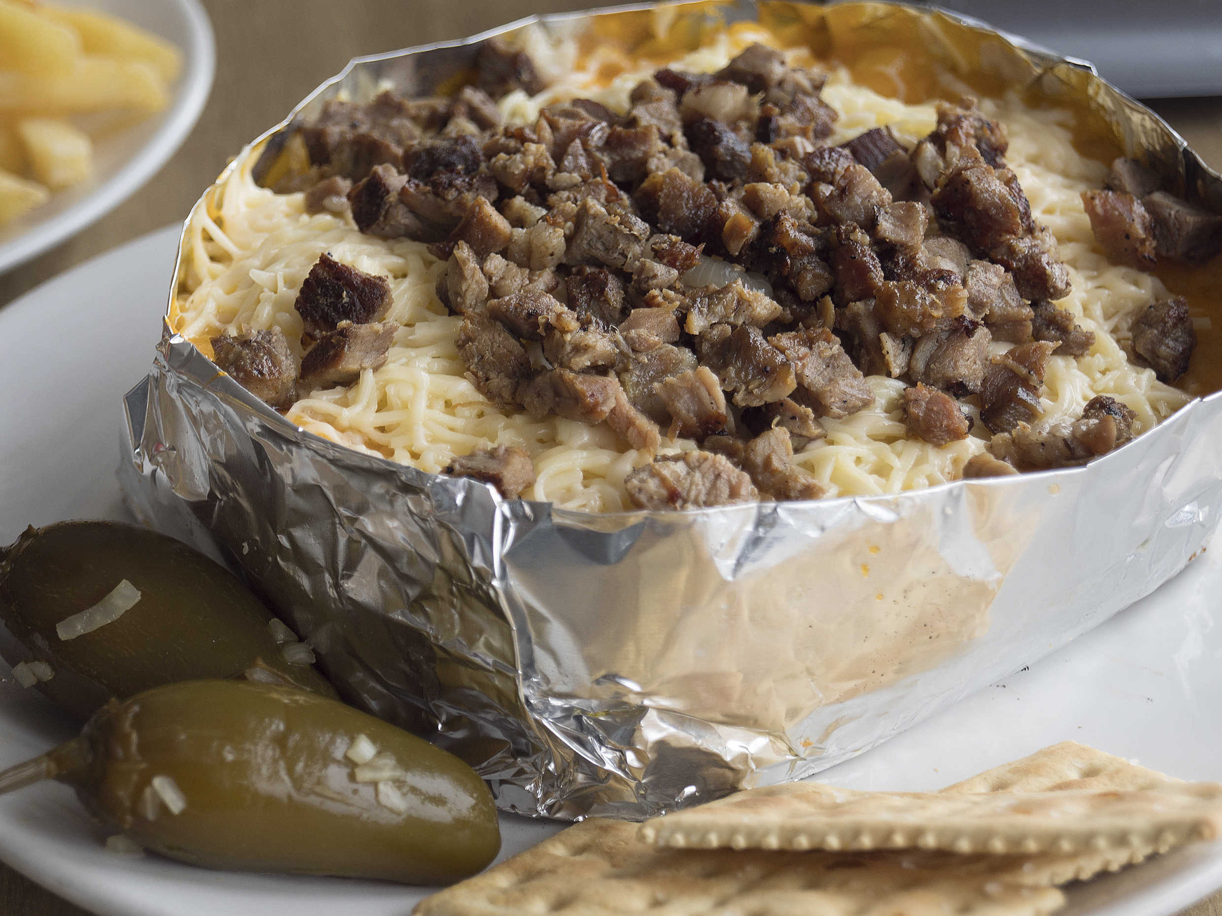 Papas Gigantes Asadas con Tocino y Carne.