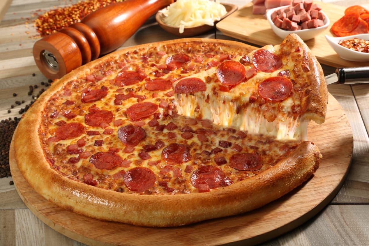 Pizza Extra Grande.