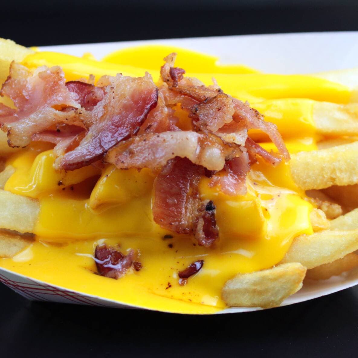 Papas Fritas con Queso y Tocino