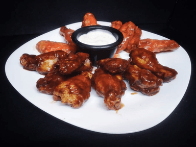 8 Alitas Lemon pepper con papas