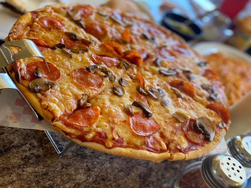 Pizzería 76