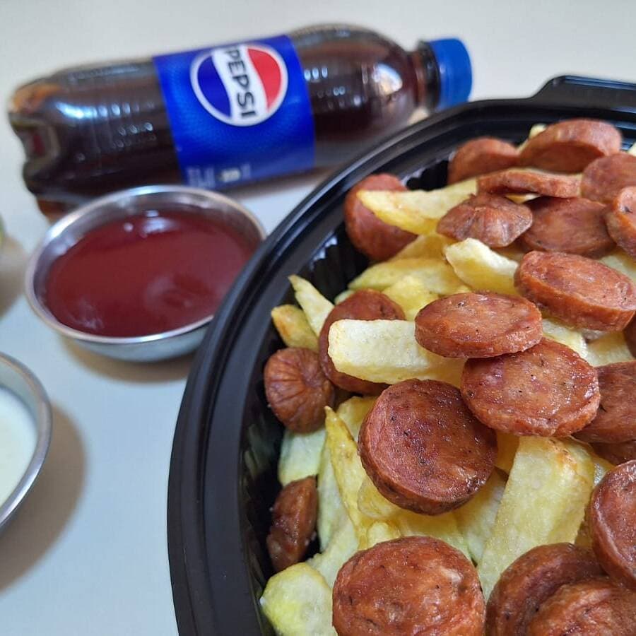 SalchiClásica más SalchiBrasa y 2 Pepsi