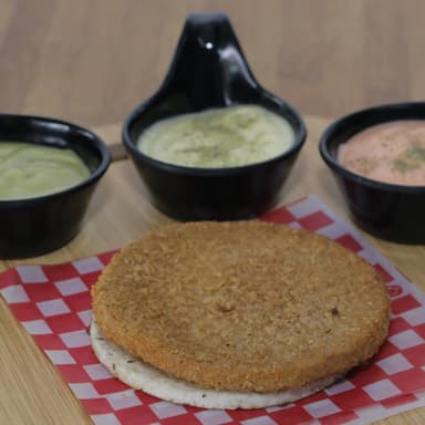 Milanesa de Pollo con Arepa Co