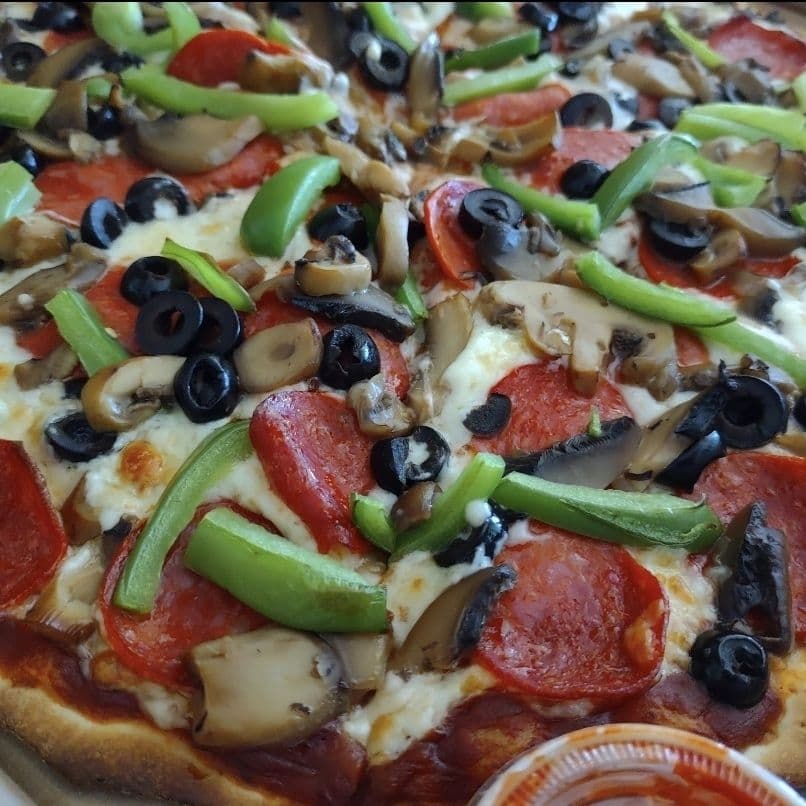 2 Pizzas Medianas de Especialidad