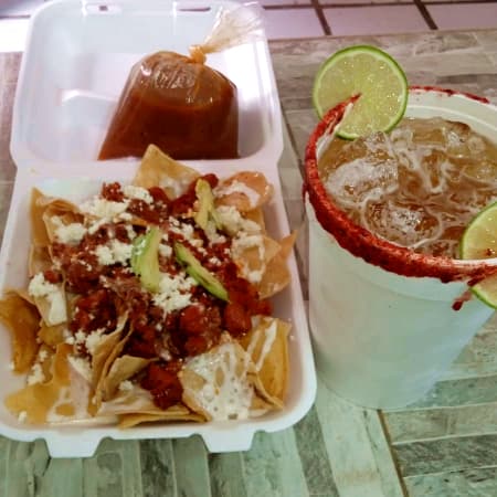 Chilaquiles de Pastor y Chorizo con Michelada