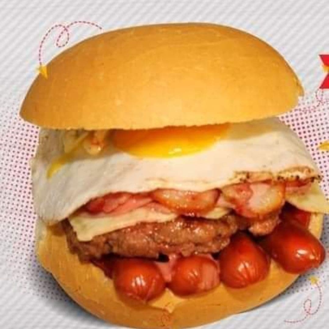 SUPER GRANJERO HAMBURGUESA.QUESO.JAMON.HUEVO.TOCIN