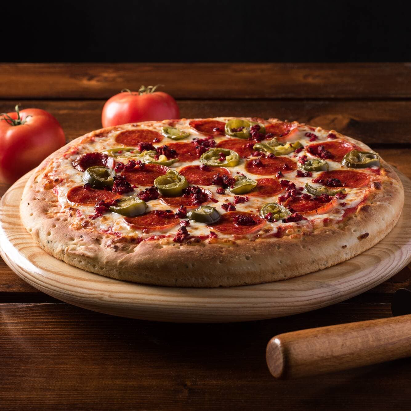 Pizza Mediana del Barrio.