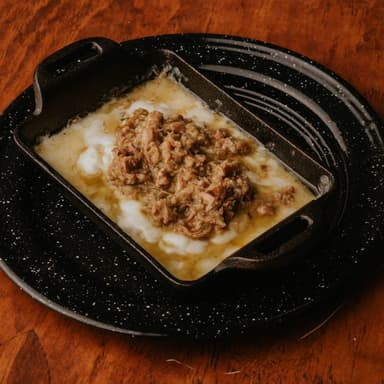 Queso Fundido con Chicharrón Prensado
