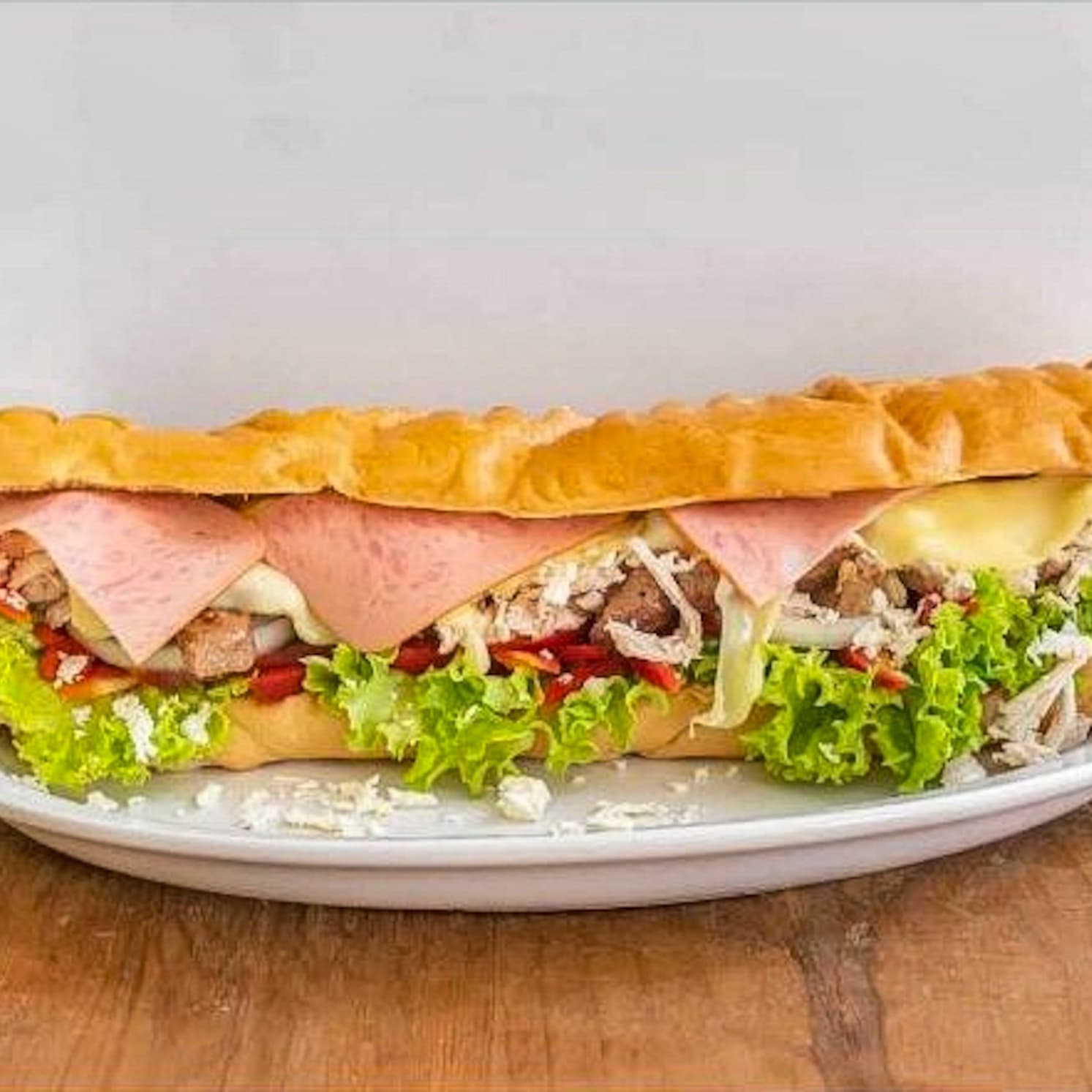 Sándwich Mixto Pollo y Cerdo