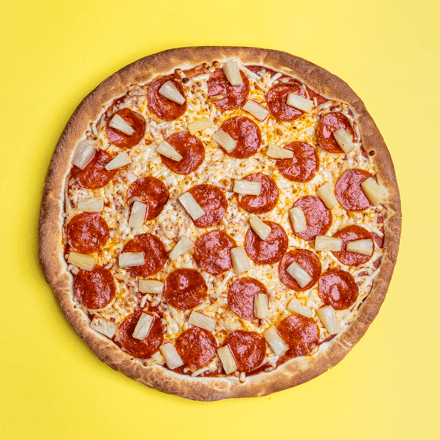 Pizza de Pepperoni y Piña.