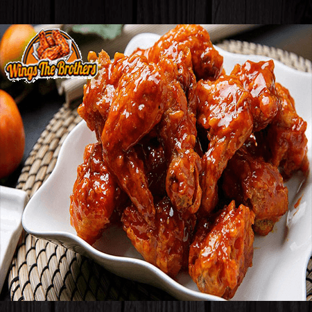 20 Alitas de Cualquier Sabor + Papas Grandes