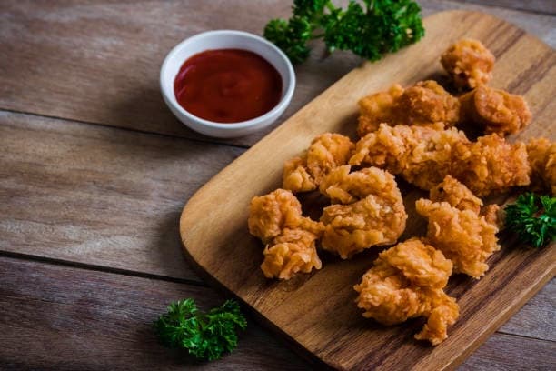 Poppin’ Chicken - Heredia