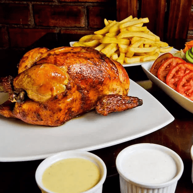 1 Pollo a la brasa + Papas + Ensalada