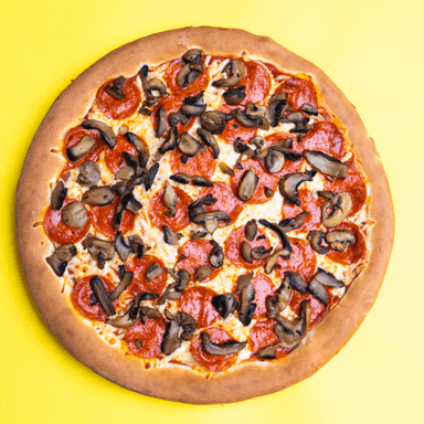 Pizza de Pepperoni y Champiñón.