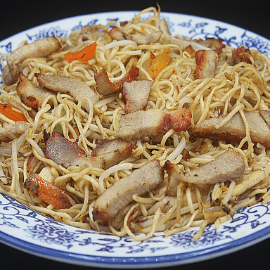 Tallarín Saltado seco al sillao con chancho