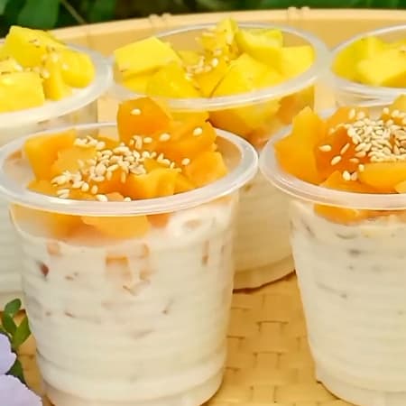 Duraznos en almíbar con crema