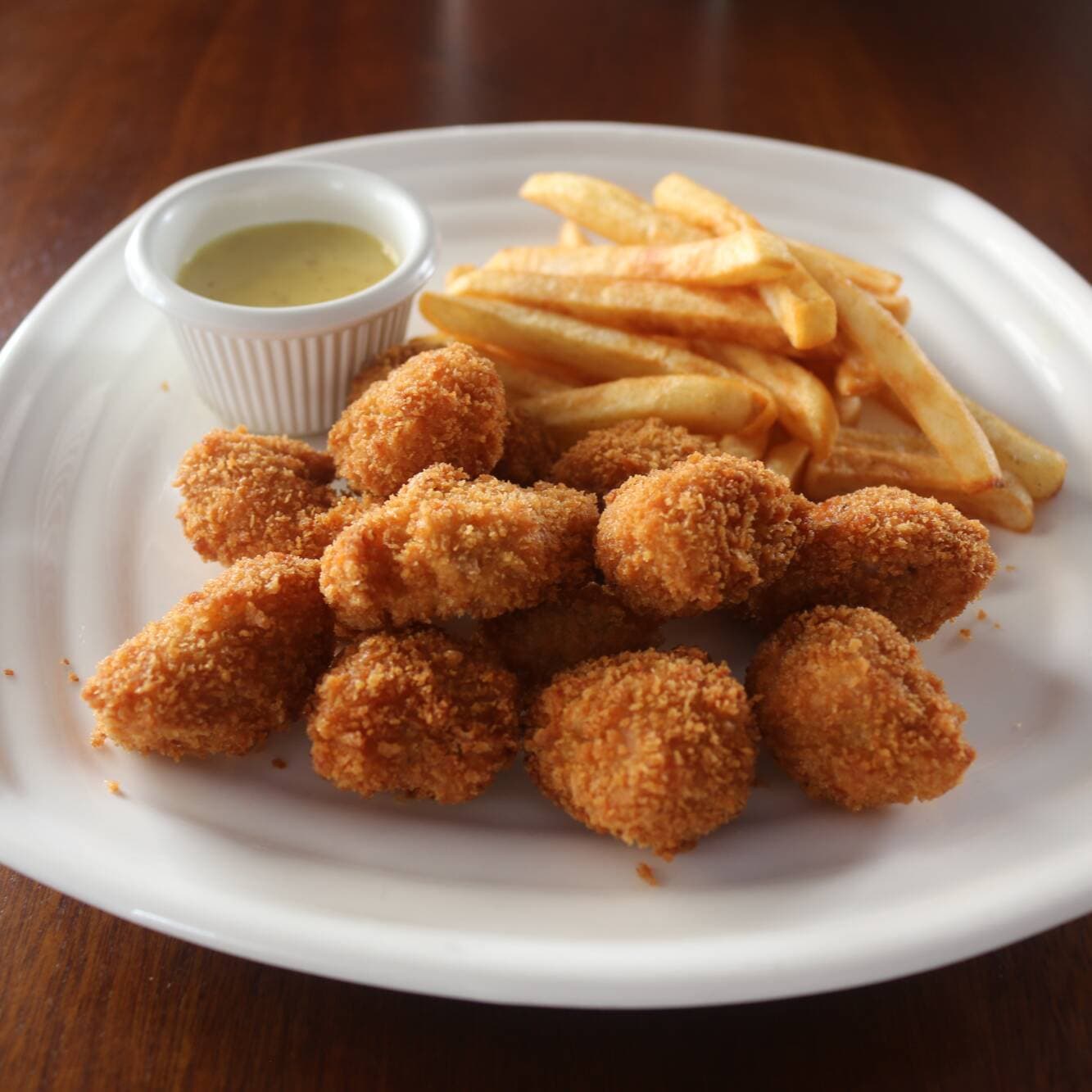 Dados de Pescado con Papas Fritas